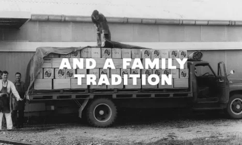 Heritage Photo of men loading truck with apples